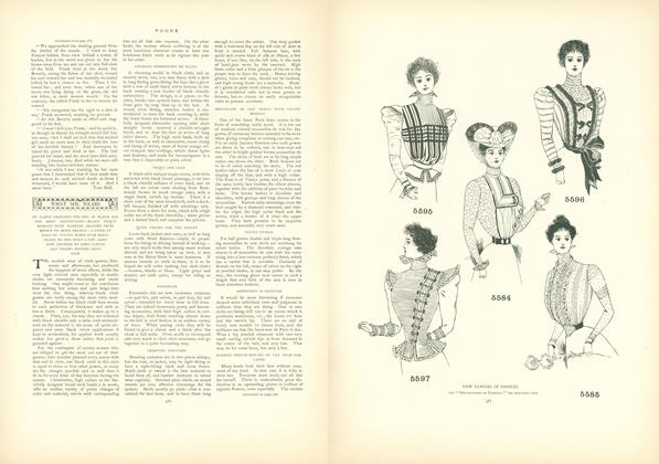 What She Wears: Of Cloth Costumes the One in Black Has the Most Distinction...